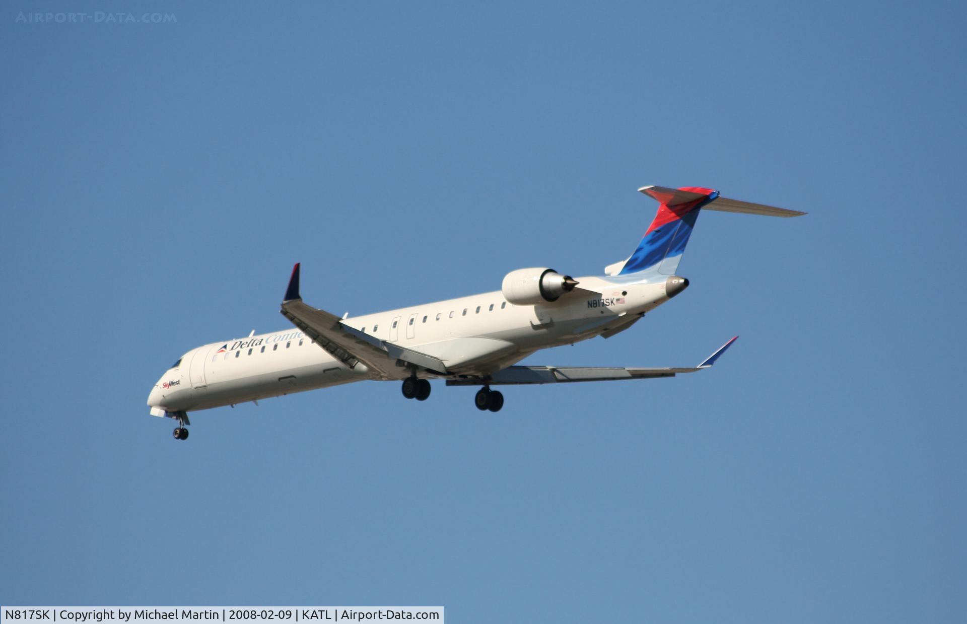 N817SK, 2006 Bombardier CRJ-900ER (CL-600-2D24) C/N 15107, Short Final for 26R