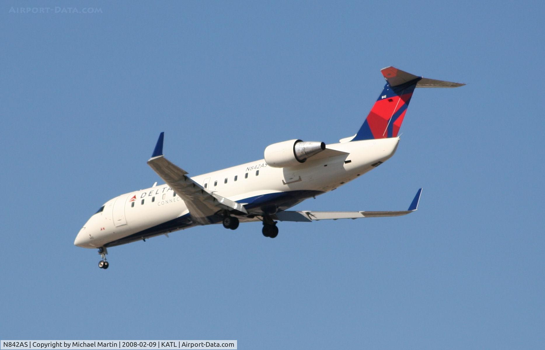 N842AS, 1999 Bombardier CRJ-200ER (CL-600-2B19) C/N 7304, Short Final for 26R