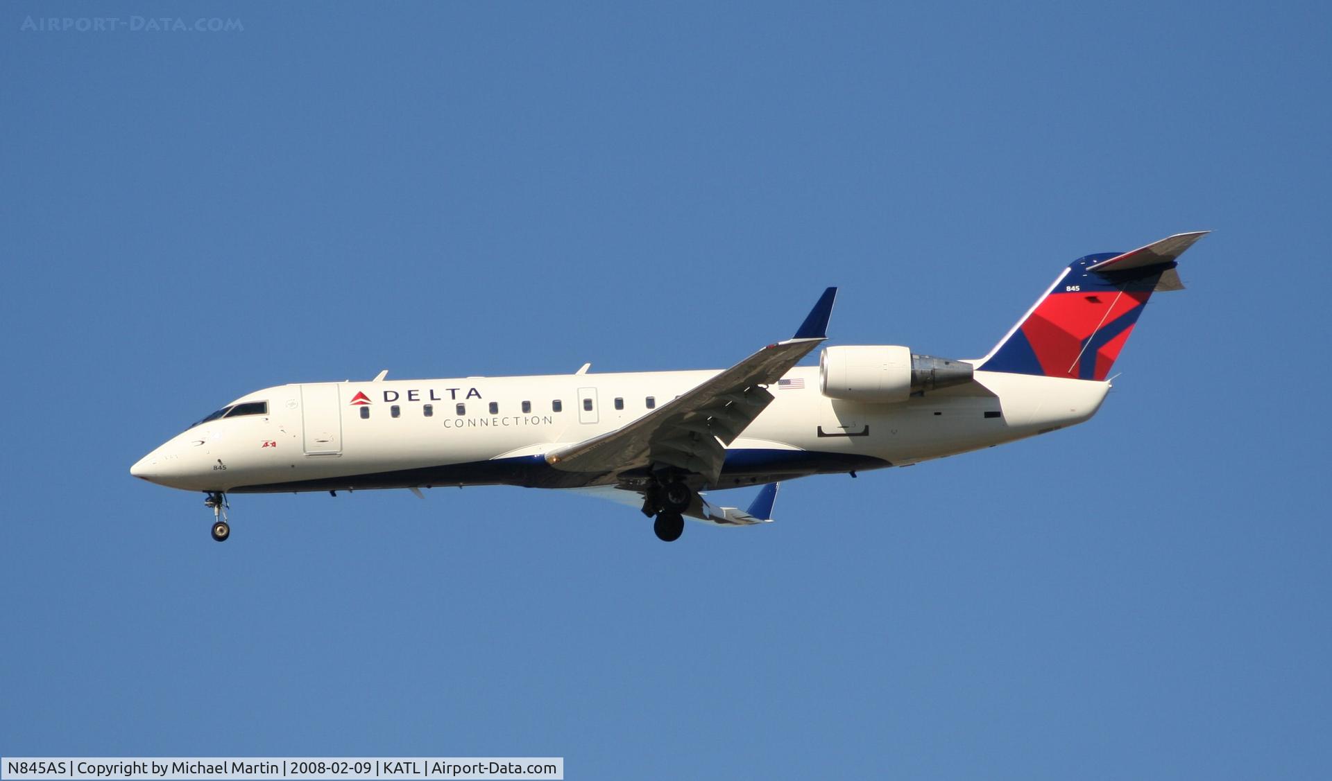 N845AS, 1999 Bombardier CRJ-200ER (CL-600-2B19) C/N 7324, Short Final for 26R