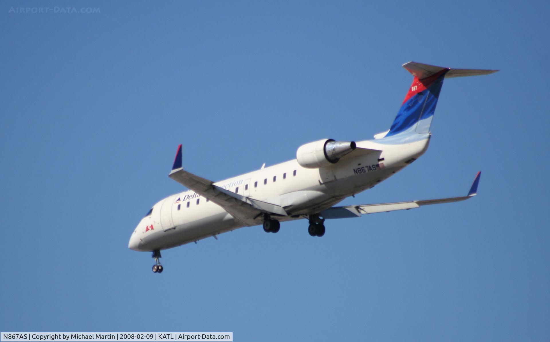 N867AS, 2000 Bombardier CRJ-200ER (CL-600-2B19) C/N 7463, Short Final for 26R