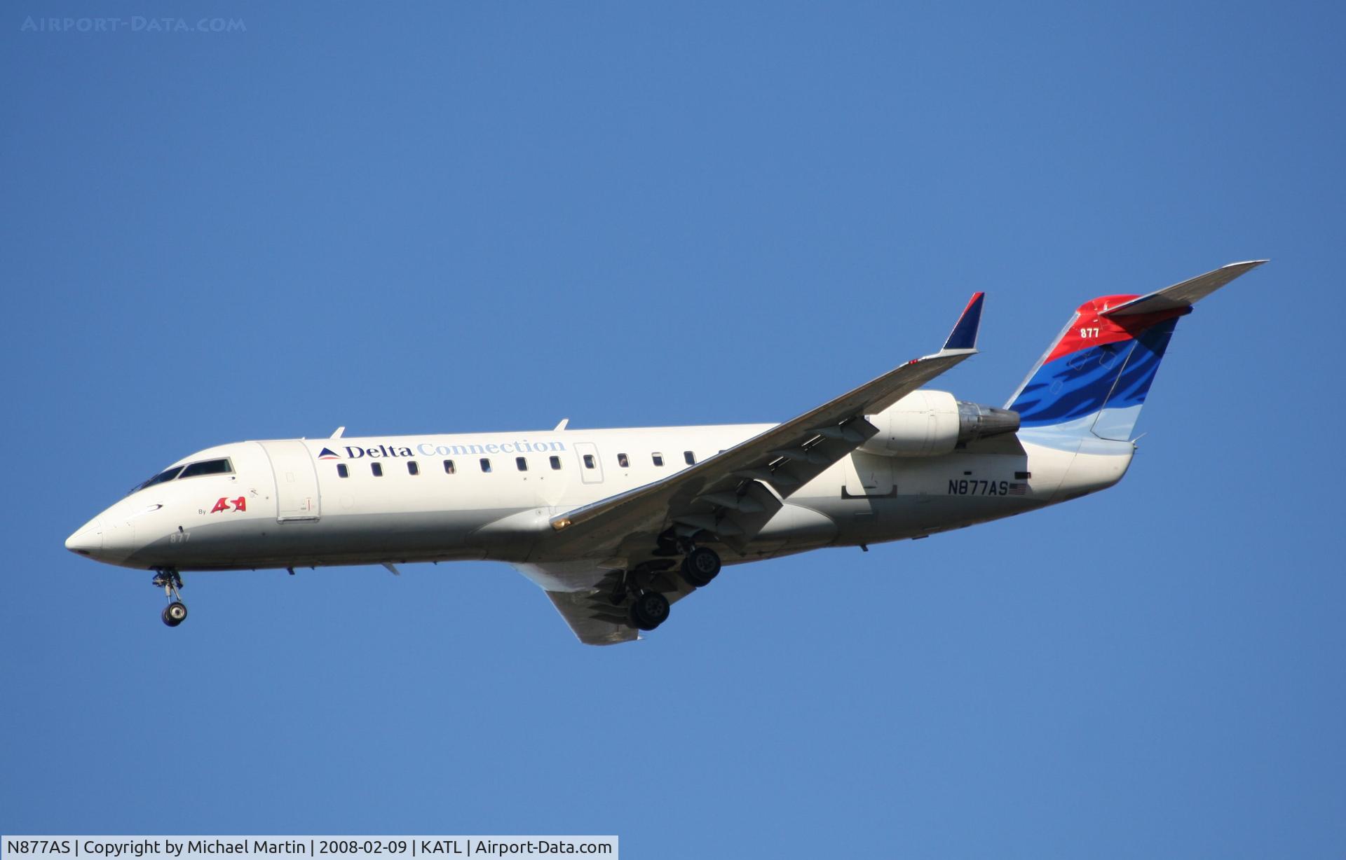 N877AS, 2001 Bombardier CRJ-200ER (CL-600-2B19) C/N 7579, On final for Runway 26R
