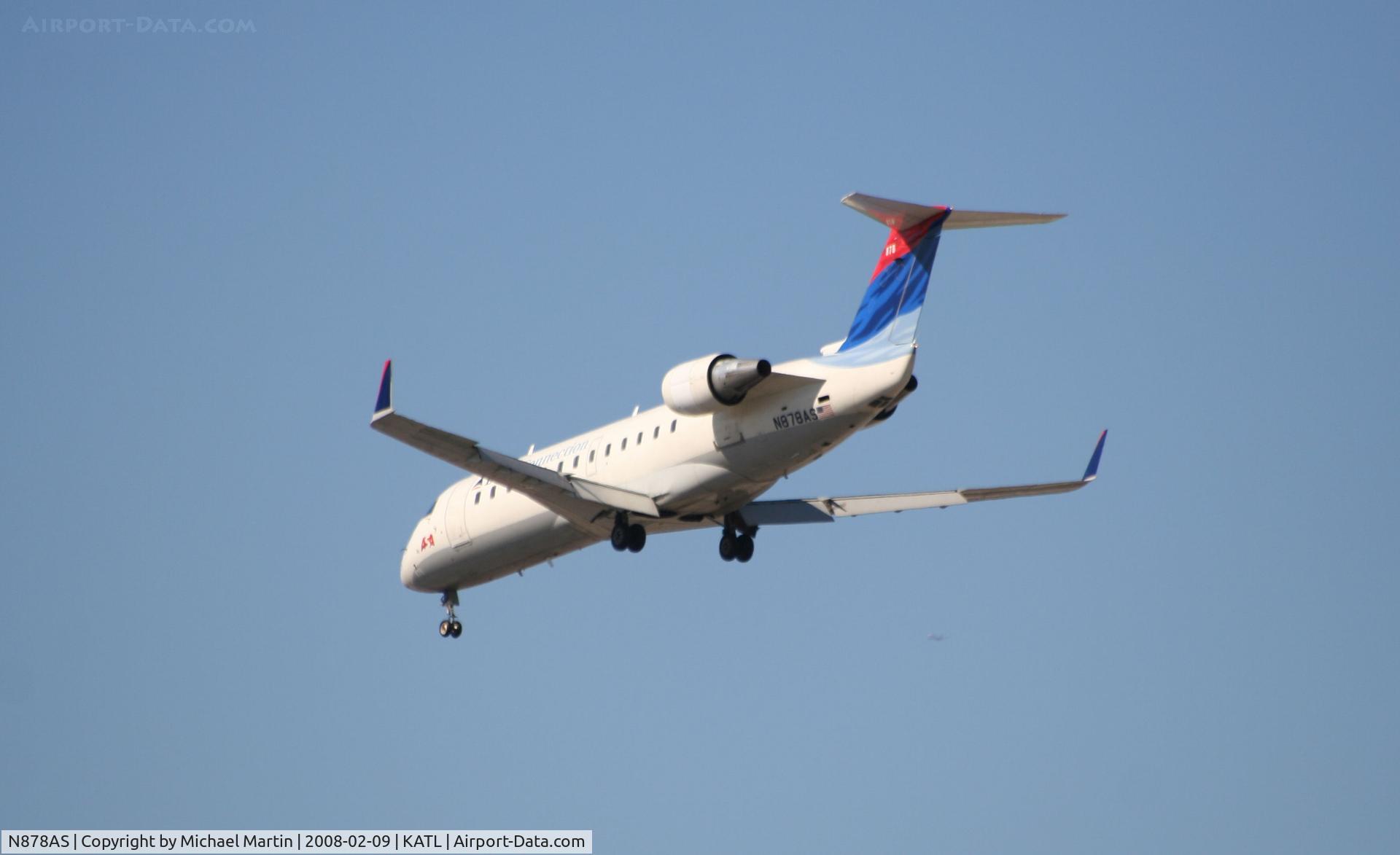 N878AS, 2002 Bombardier CRJ-200ER (CL-600-2B19) C/N 7590, Short Final for 26R
