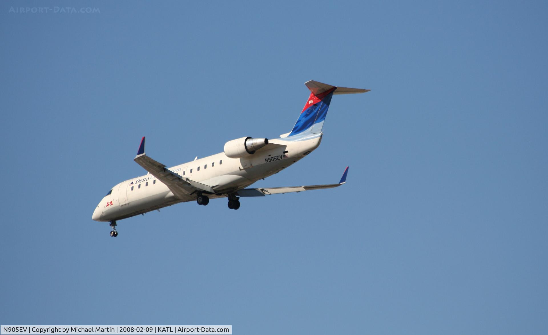 N905EV, 2002 Bombardier CRJ-200ER (CL-600-2B19) C/N 7632, Short Final for 26R