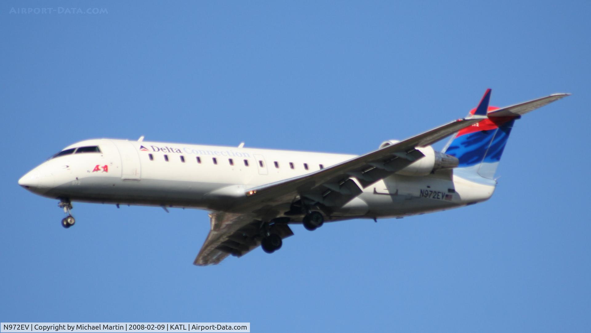 N972EV, 2001 Bombardier CRJ-200ER (CL-600-2B19) C/N 7534, On final for Runway 26R