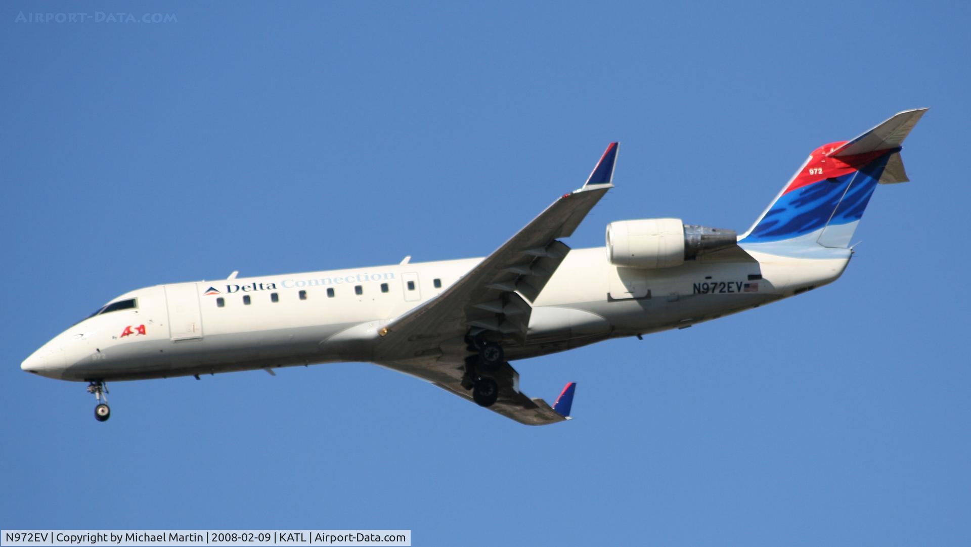N972EV, 2001 Bombardier CRJ-200ER (CL-600-2B19) C/N 7534, On final for Runway 26R