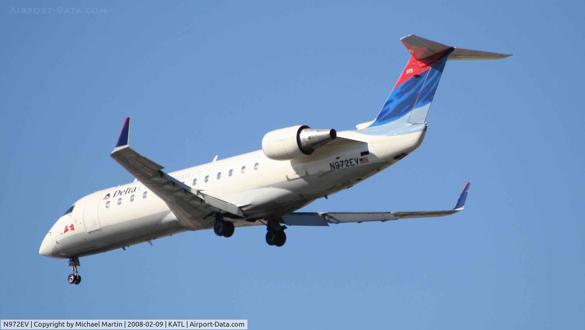 N972EV, 2001 Bombardier CRJ-200ER (CL-600-2B19) C/N 7534, Short Final for 26R