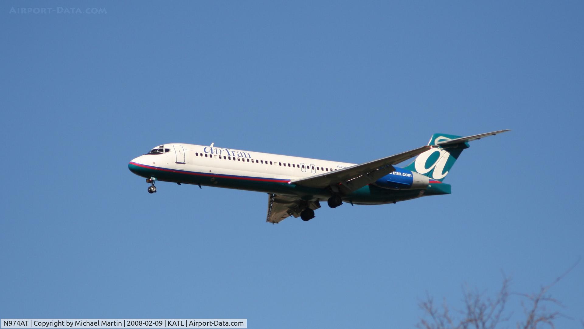 N974AT, 2002 Boeing 717-200 C/N 55034, On final for Runway 26R