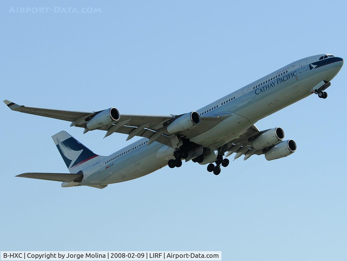 B-HXC, Airbus A340-313 C/N 142, Climbing after take off RWY 25.