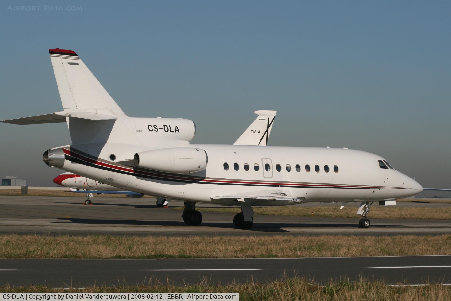 CS-DLA, 1993 Dassault Falcon 900B C/N 120, manoeuvring to park on General Aviation apron