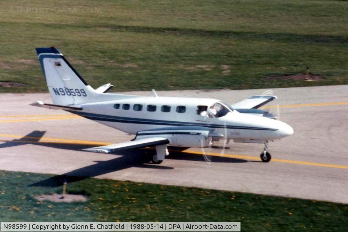 N98599, Cessna 441 Conquest II C/N Not found N98599, Photo taken for aircraft recognition training.  Cessna 441 taxiing by the control tower