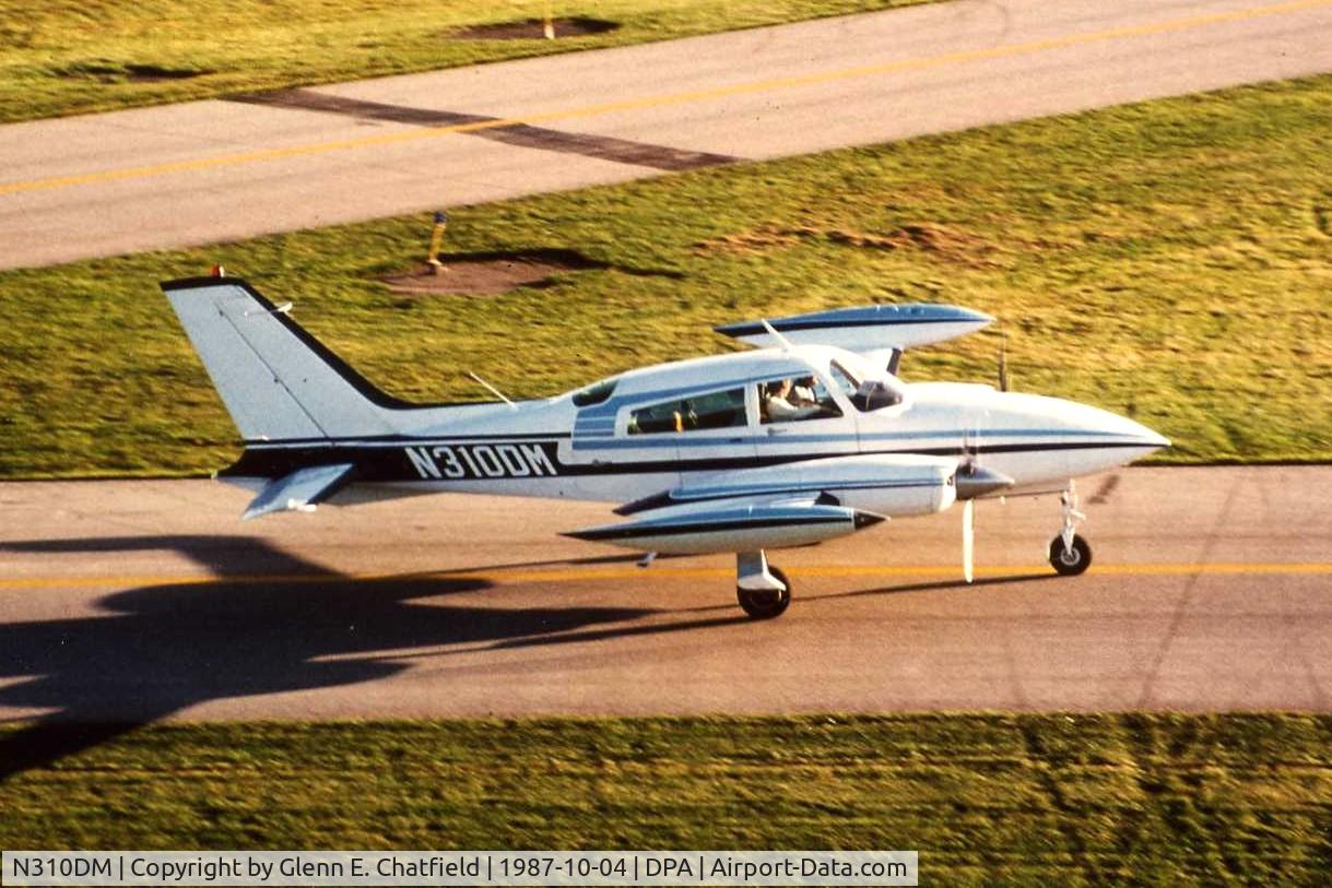 N310DM, 1976 Cessna 310R C/N 310R0641, Photo taken for aircraft recognition training.  C310 taxiing by the control tower
