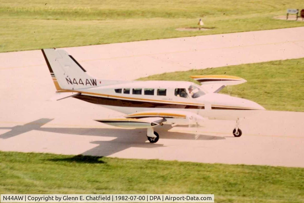 N44AW, Cessna 402B C/N 402B1025, Photo taken for aircraft recognition training.  taxiing by the control tower