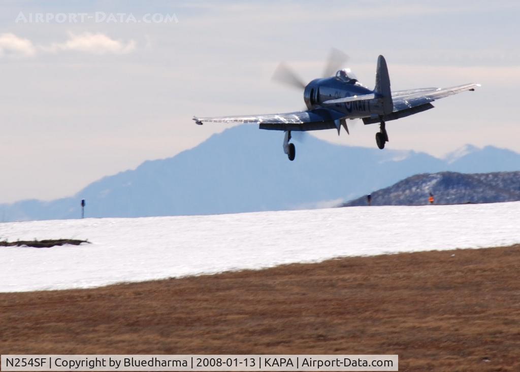 N254SF, 1956 Hawker FB60 Fury Replica C/N 37514, Landing on 17L. Pikes Peak in the distance.