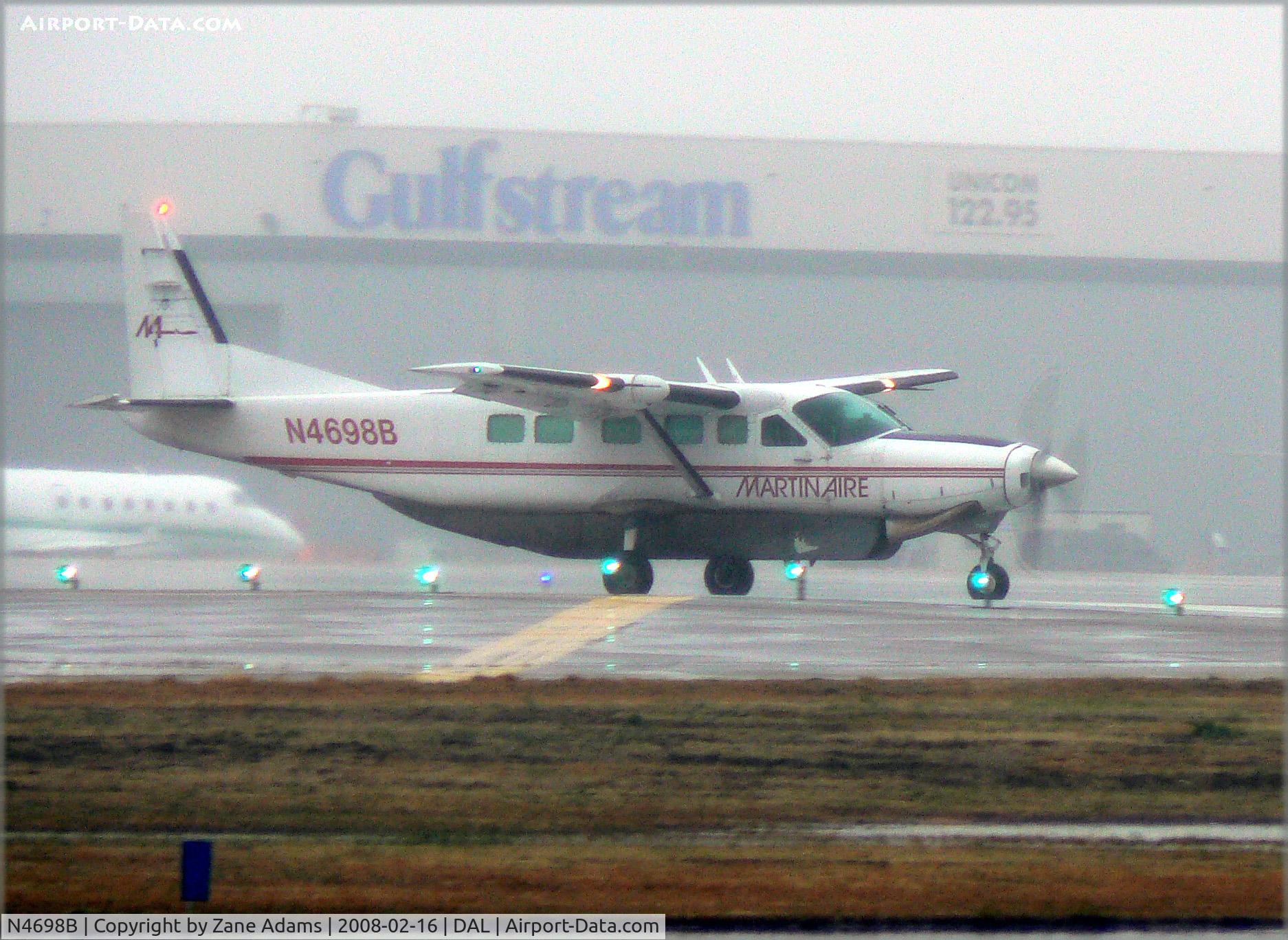 N4698B, 1989 Cessna 208B C/N 208B0175, In the rain at Love Field, Dallas, TX