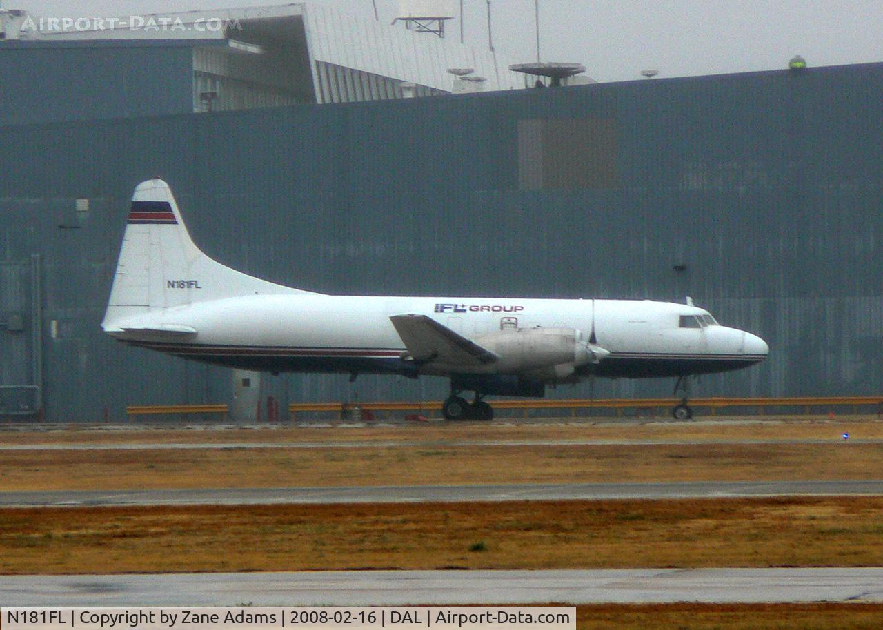 N181FL, 1956 Convair 580 C/N 387, In the rain at Love Field, Dallas, TX