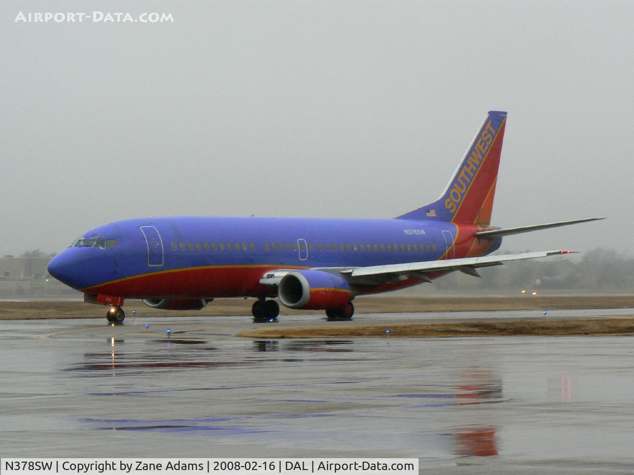 N378SW, 1994 Boeing 737-3H4 C/N 26585, Southwest Airlines - In the rain at Love Field, Dallas, TX