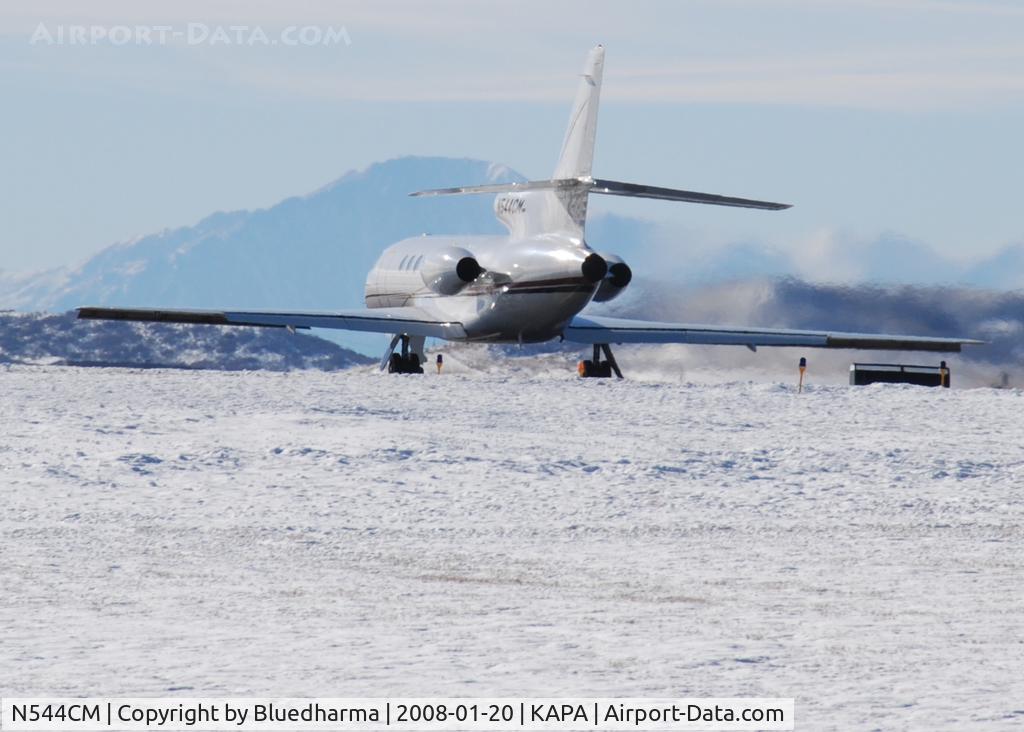 N544CM, 1987 Dassault Falcon 50 C/N 173, Takeoff on 17L. Pikes peak in the distance.