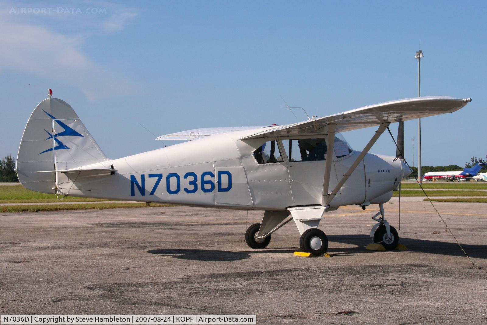 N7036D, 1957 Piper PA-22-150 C/N 22-4934, Sitting in the sun at Opa Locka