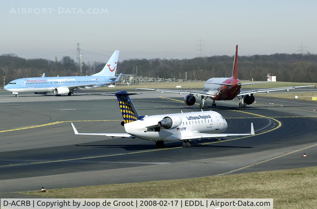 D-ACRB, 2001 Canadair CRJ-200ER (CL-600-2B19) C/N 7570, This CL-600 awaits his turn for take off behind an Air Berlin A320 and Hapag Lloyd 737.