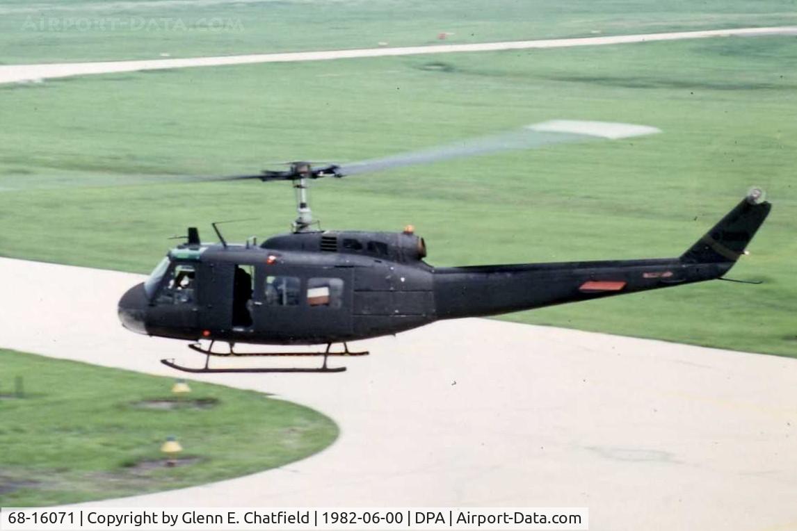 68-16071, 1968 Bell UH-1H Iroquois C/N 10730, UH-1H flying by the control tower