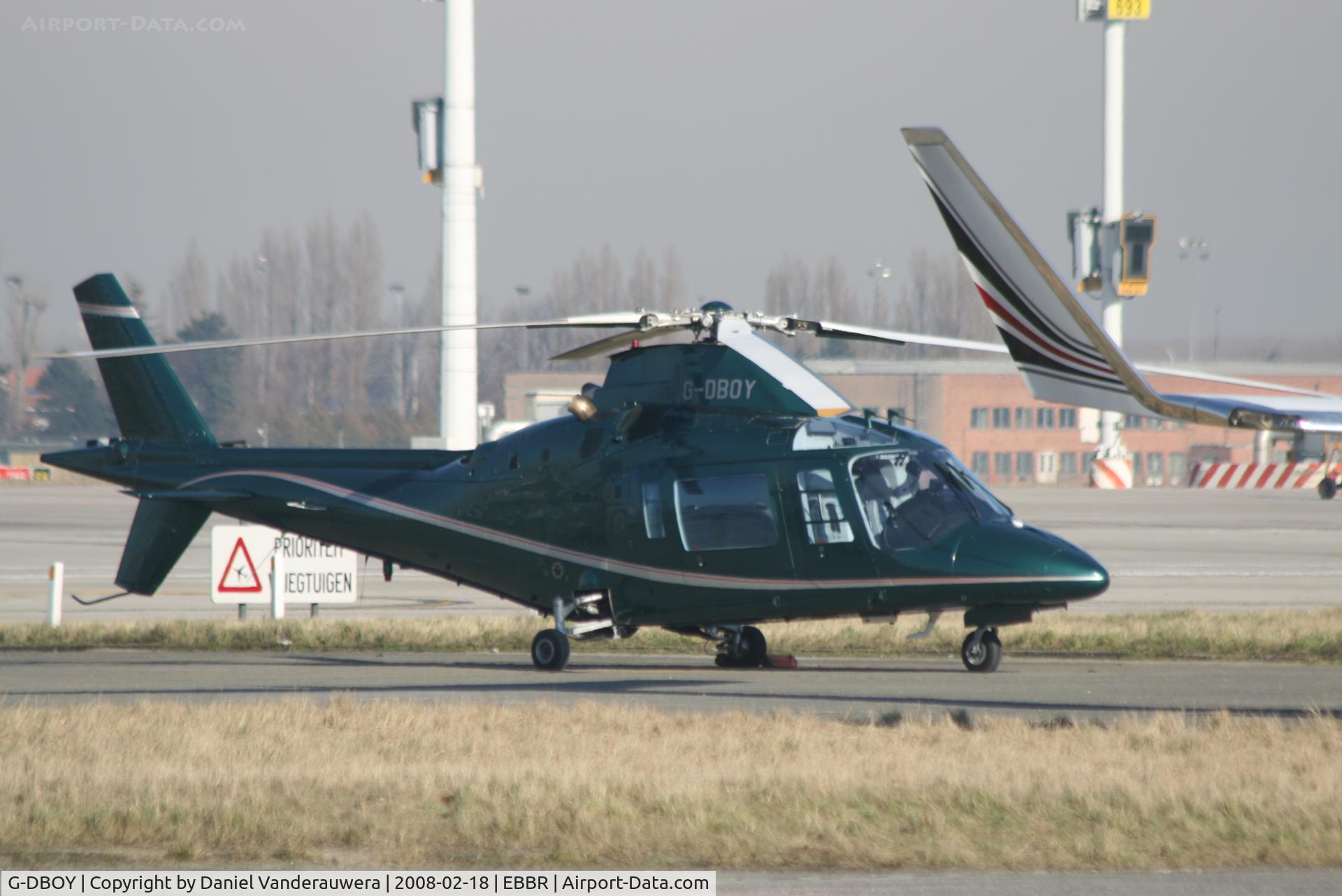 G-DBOY, 1990 Agusta A-109C C/N 7622, parked on General Aviation apron