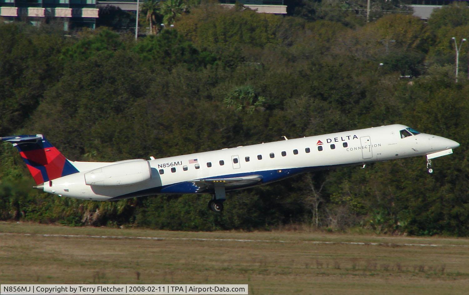 N856MJ, 2002 Embraer ERJ-145LR (EMB-145LR) C/N 145626, Delta Connection Embraer climbs away from Tampa