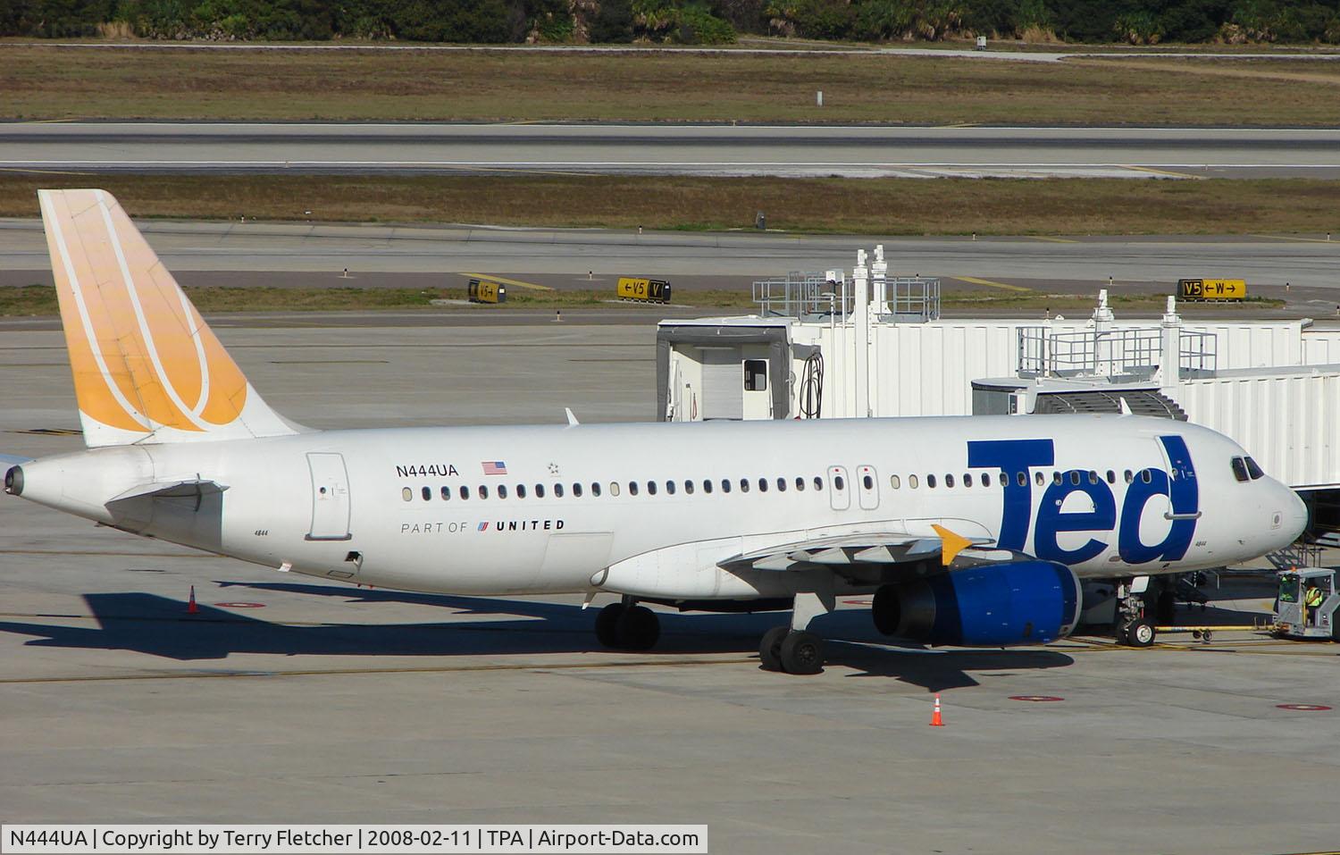 N444UA, 1998 Airbus A320-232 C/N 824, TED A320 on stand at Tampa