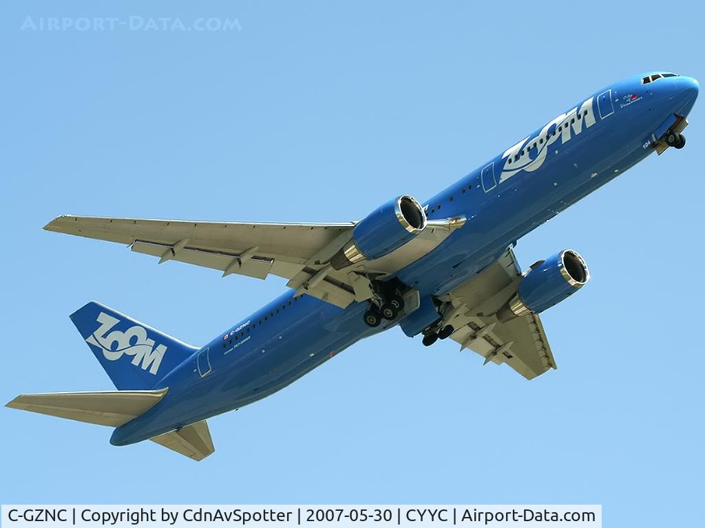 C-GZNC, 1995 Boeing 767-306/ER C/N 26263, Retracting the landing gear after takeoff from Rwy 16