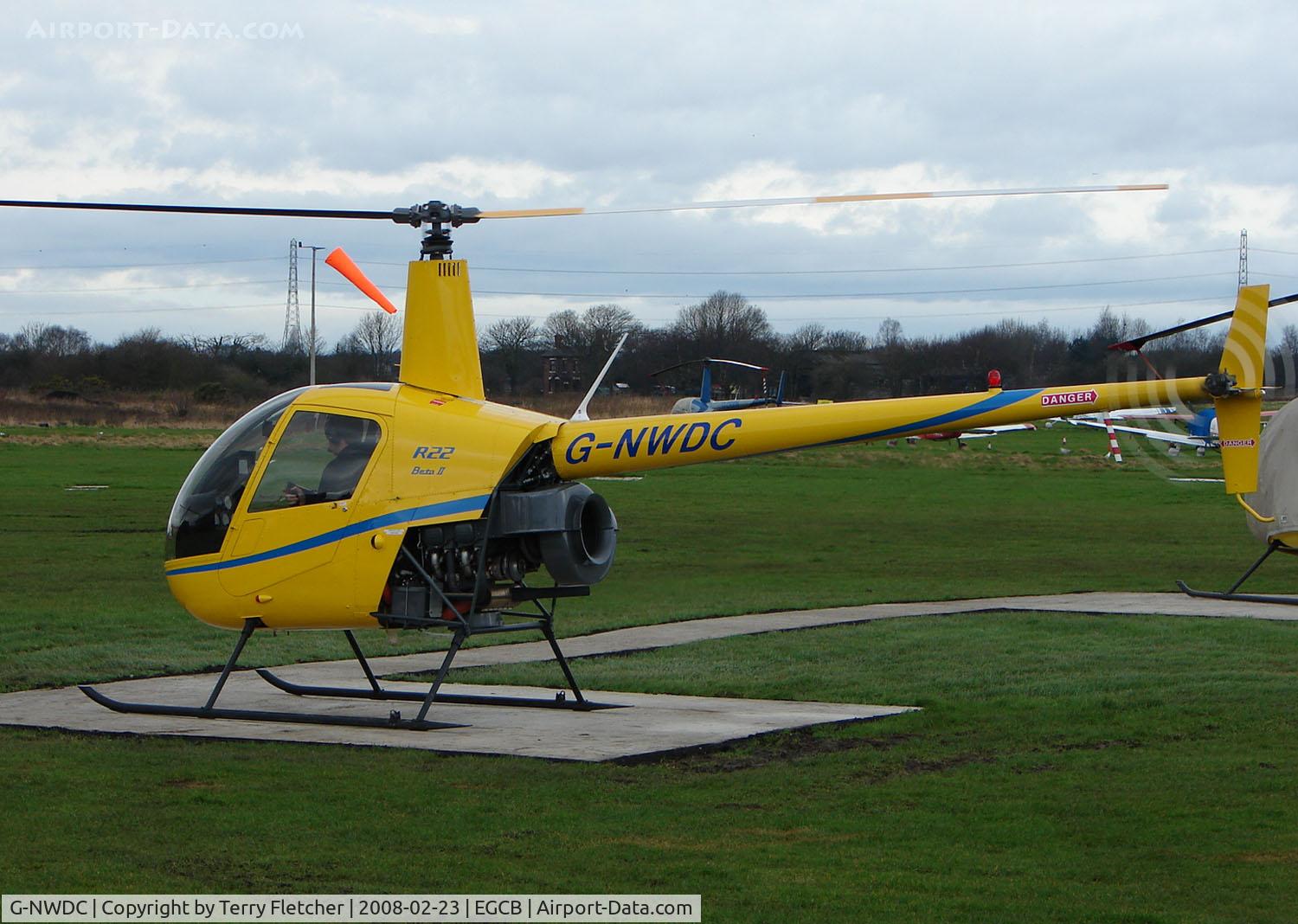 G-NWDC, 2005 Robinson R22 Beta C/N 3929, Robinson R22 at Manchester Barton in Feb 2008