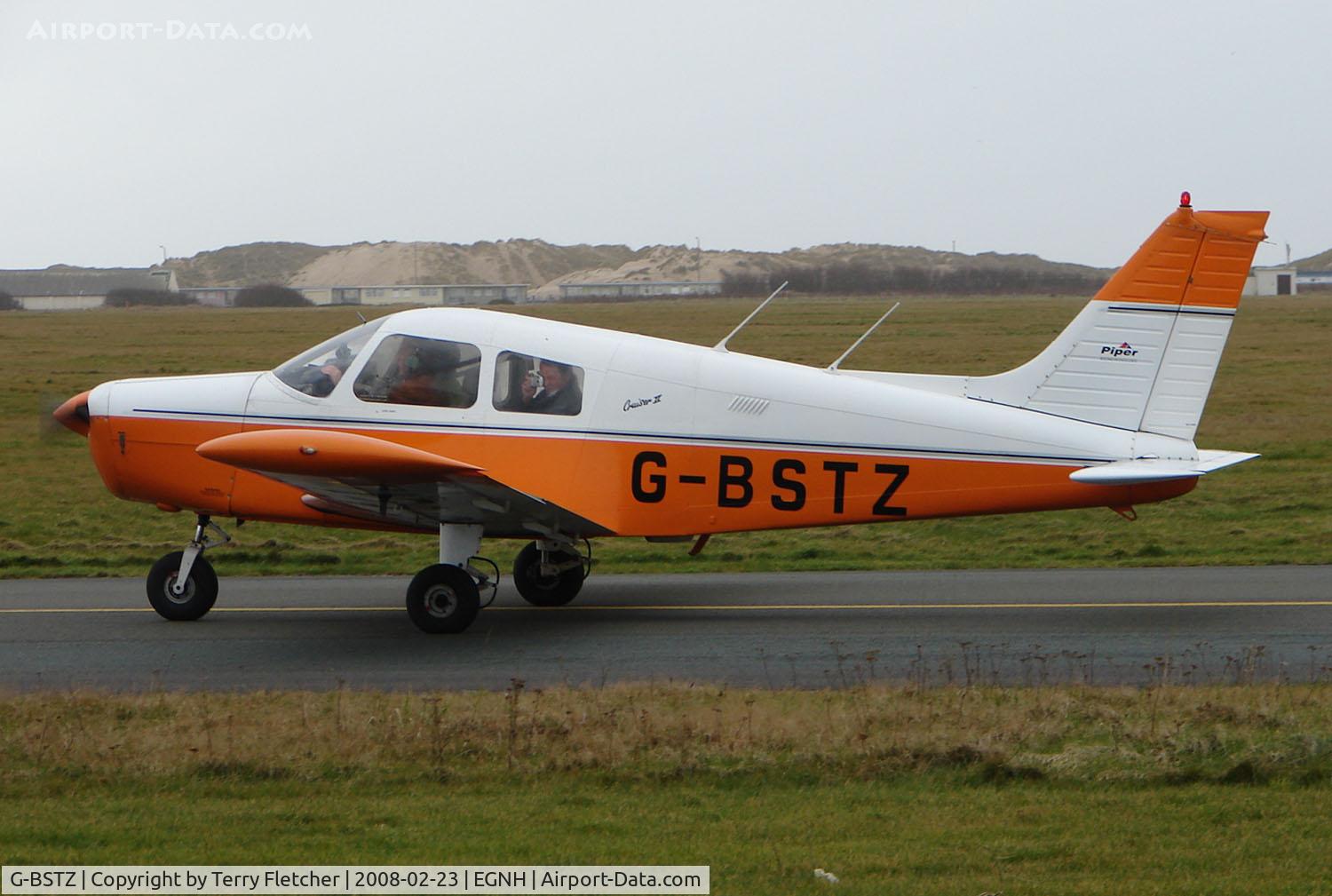 G-BSTZ, 1977 Piper PA-28-140 Cherokee Cruiser C/N 28-7725153, This Piper wear the Tangerine and White Colours of the local Soccer Team