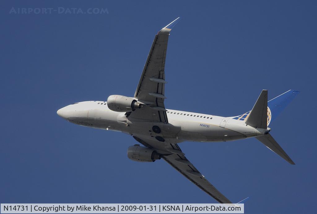 N14731, 1999 Boeing 737-724 C/N 28799, Continental B737-724 climbing up on a beautiful day.