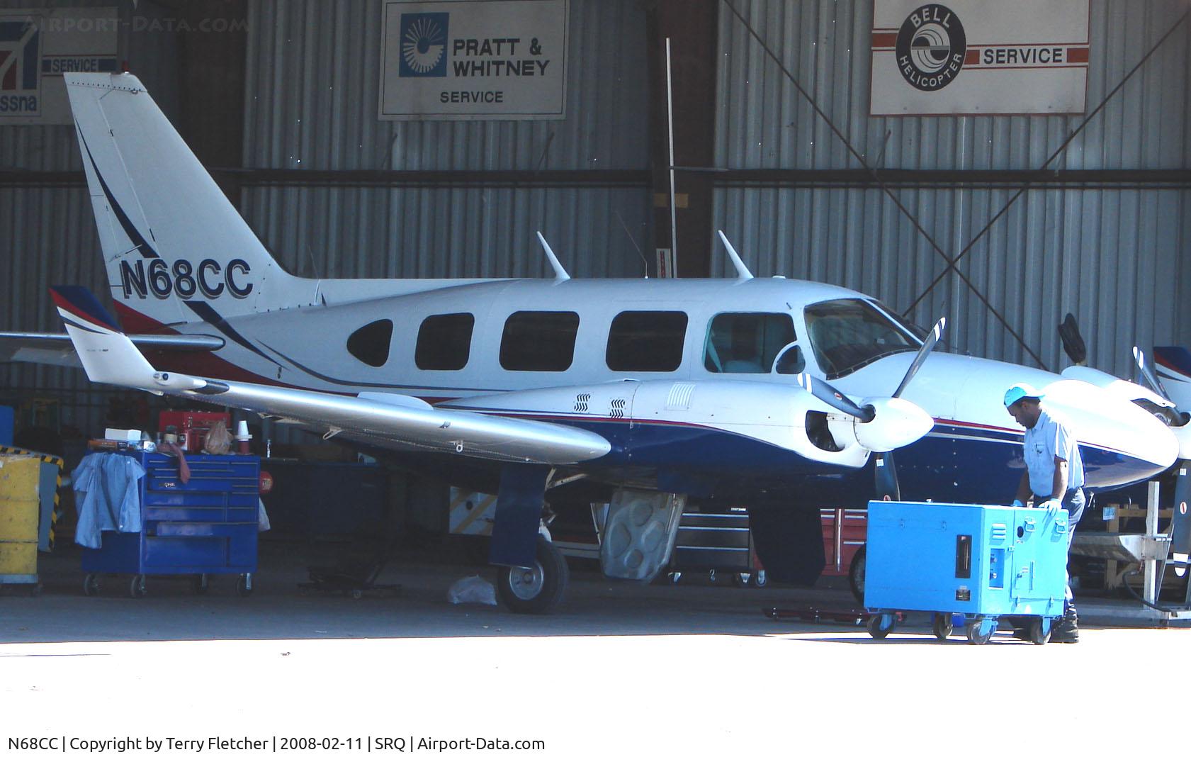 N68CC, 1974 Piper PA-31-310 Navajo C/N 31-7300910, Piper receives maintenance attention at Sarasota