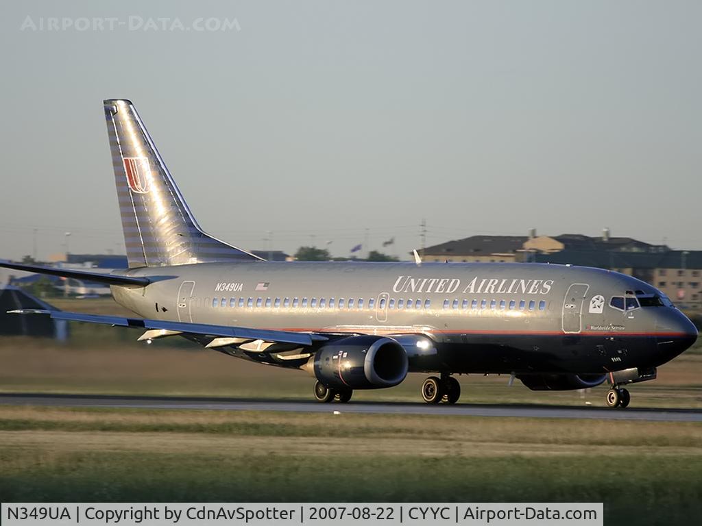 N349UA, 1988 Boeing 737-322 C/N 24253, On the takeoff roll on Rwy 28 in the early morning