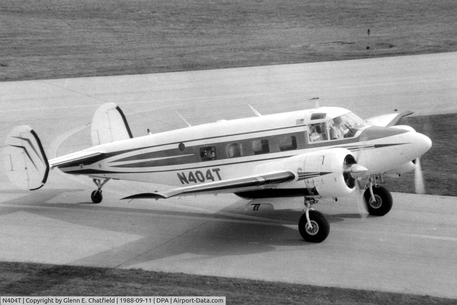 N404T, 1959 Beech E18S-9700 Twin Beech C/N BA-432, Dick Hansen taxiing by the control tower