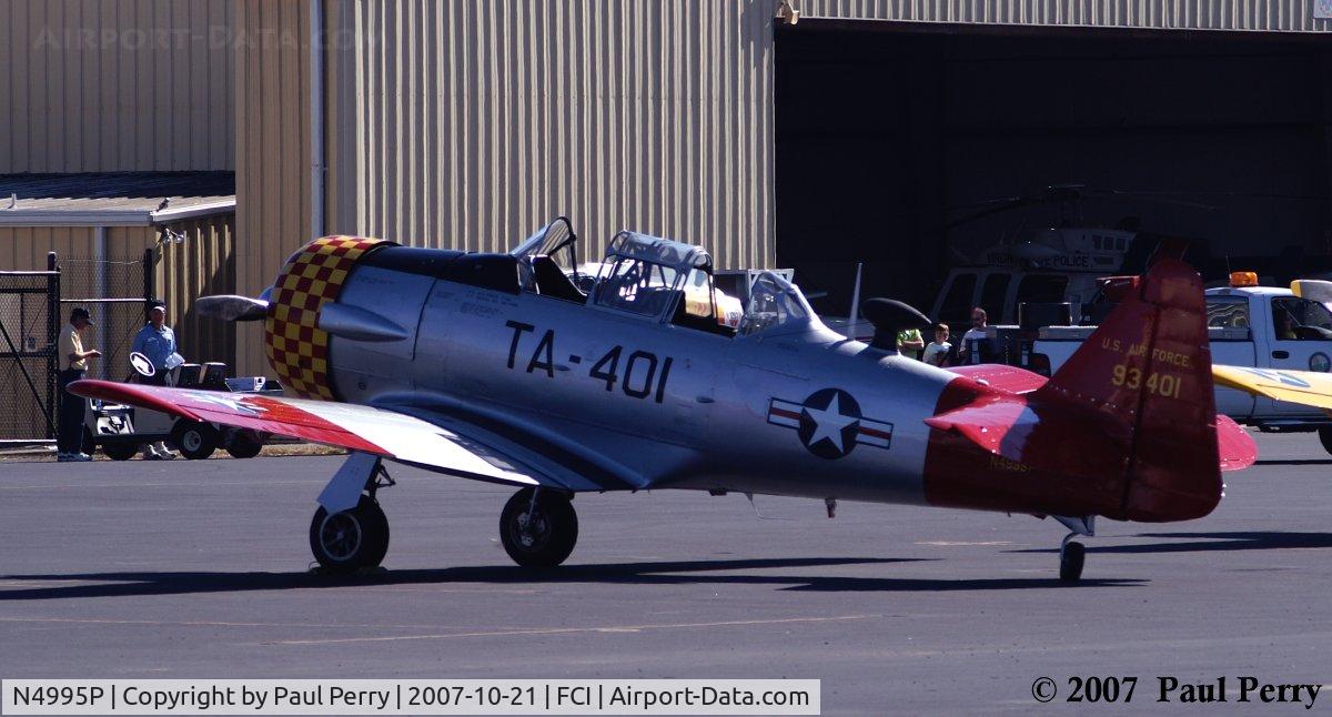 N4995P, 1951 North American T-6G Texan C/N 168-525, Awaiting her part in the morning sun