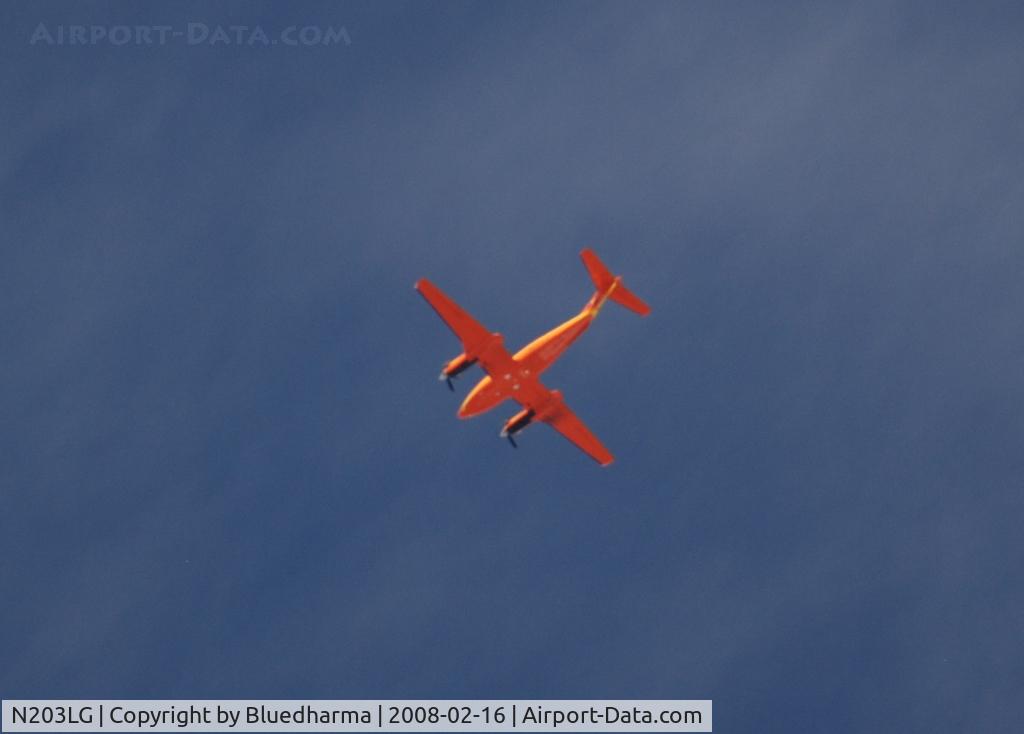 N203LG, 1981 Beech B200 King Air C/N BB-926, Flight for Life flying over Columbine High School heading West.