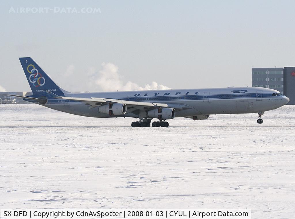 SX-DFD, 1999 Airbus A340-313 C/N 292, Olympic Airways from Athens, Greece landing on Rwy 24R with the reverse thrusters deployed