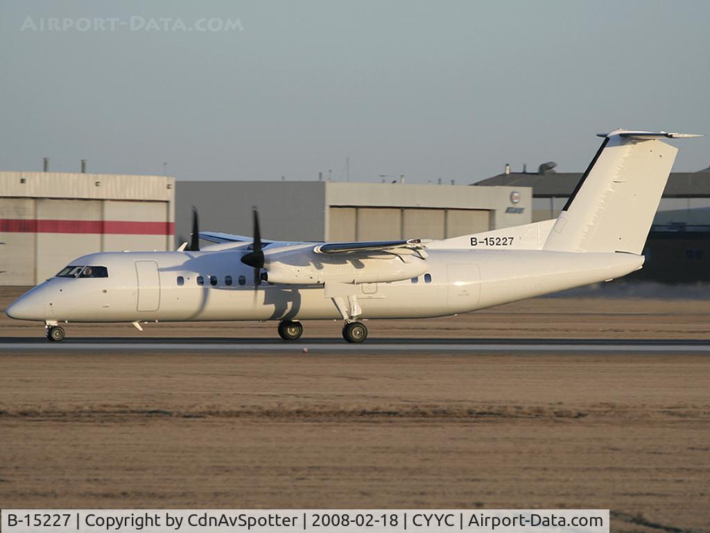 B-15227, 1995 De Havilland Canada DHC-8-311B Dash 8 C/N 406, Ex Uni Air DHC-8 seen being serviced in Calgary