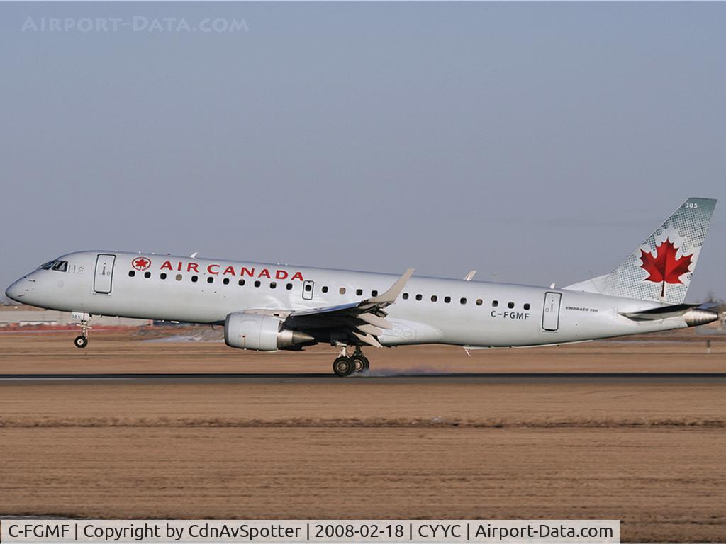 C-FGMF, 2005 Embraer 190AR (ERJ-190-100IGW) C/N 19000019, Big Smoke show from a small plane as this AC E190 touches down on Rwy 34