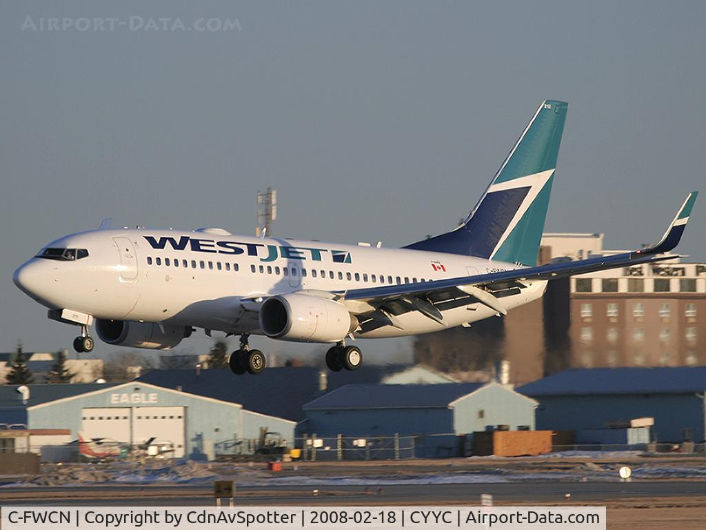 C-FWCN, 2003 Boeing 737-7CT C/N 33698, About to land on Rwy 34