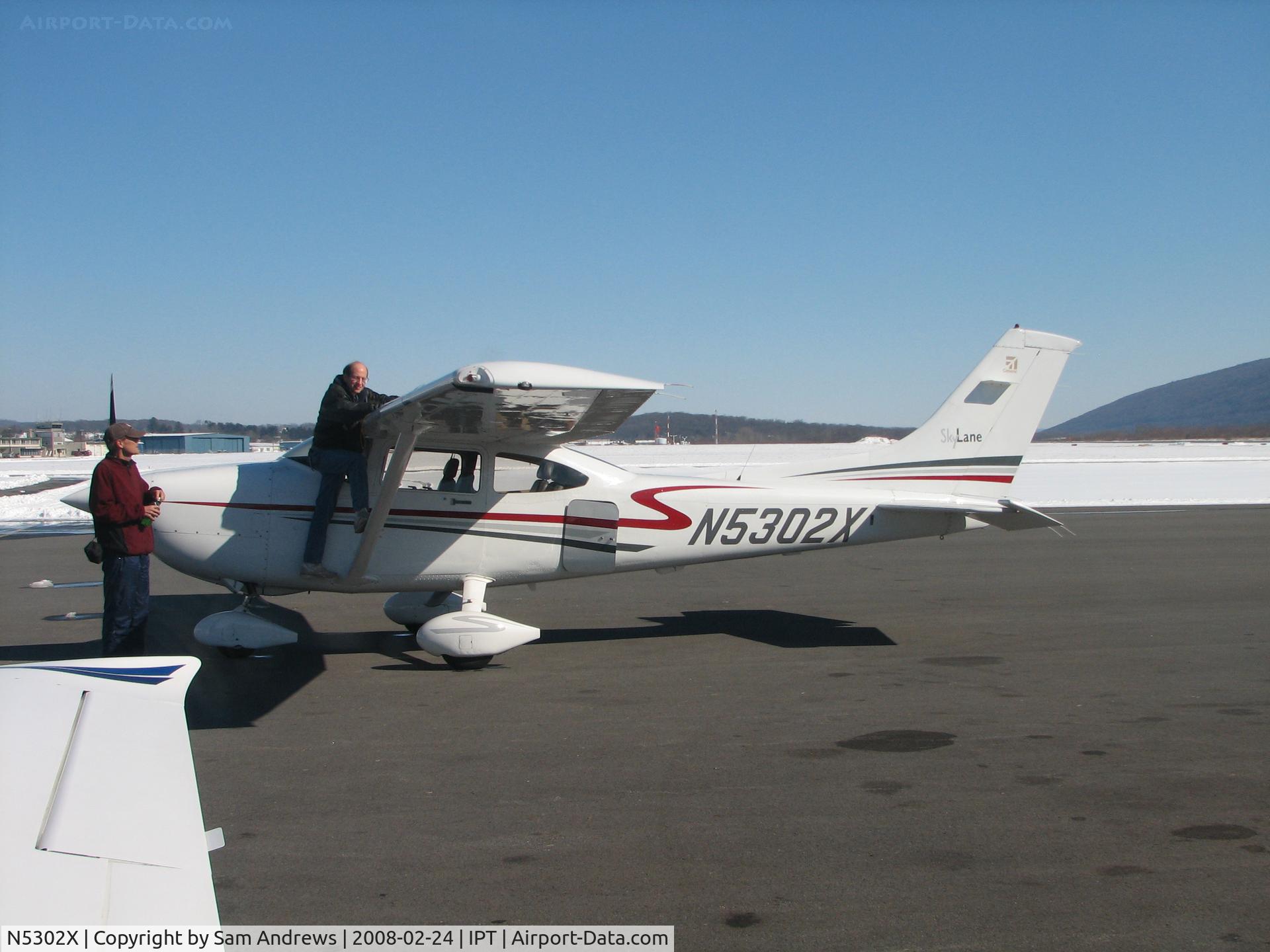 N5302X, 2003 Cessna 182T Skylane C/N 18281175, Doing what every good pilot does before flight
