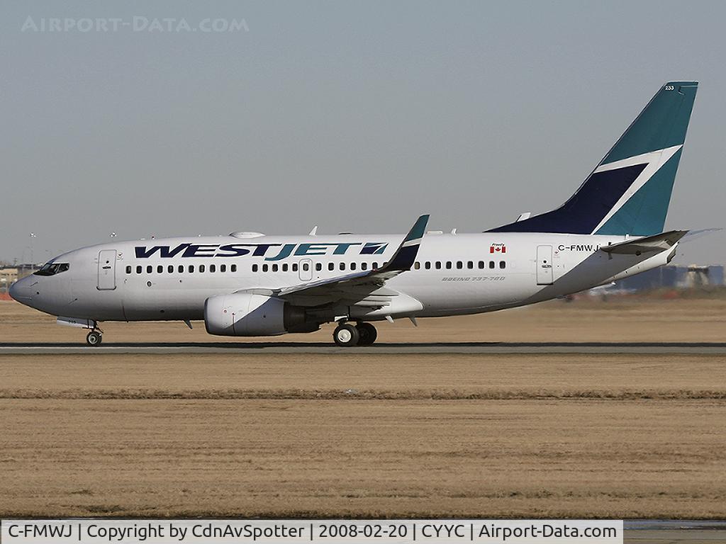 C-FMWJ, 2005 Boeing 737-7CT C/N 32771, On the takeoff roll on Rwy 34