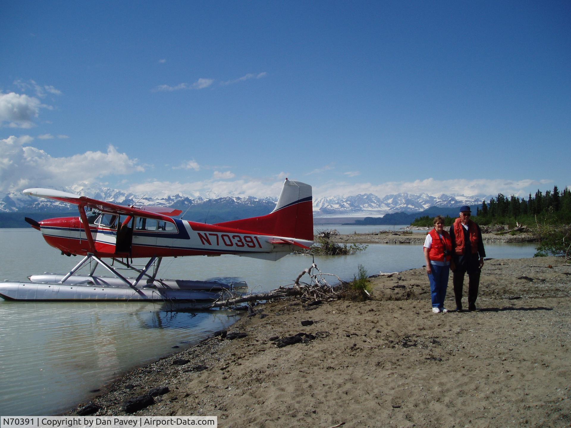 N70391, 1973 Cessna A185F Skywagon 185 C/N 18502144, Owner and wife on Beluga Lake, Alaska (Alaska Range)