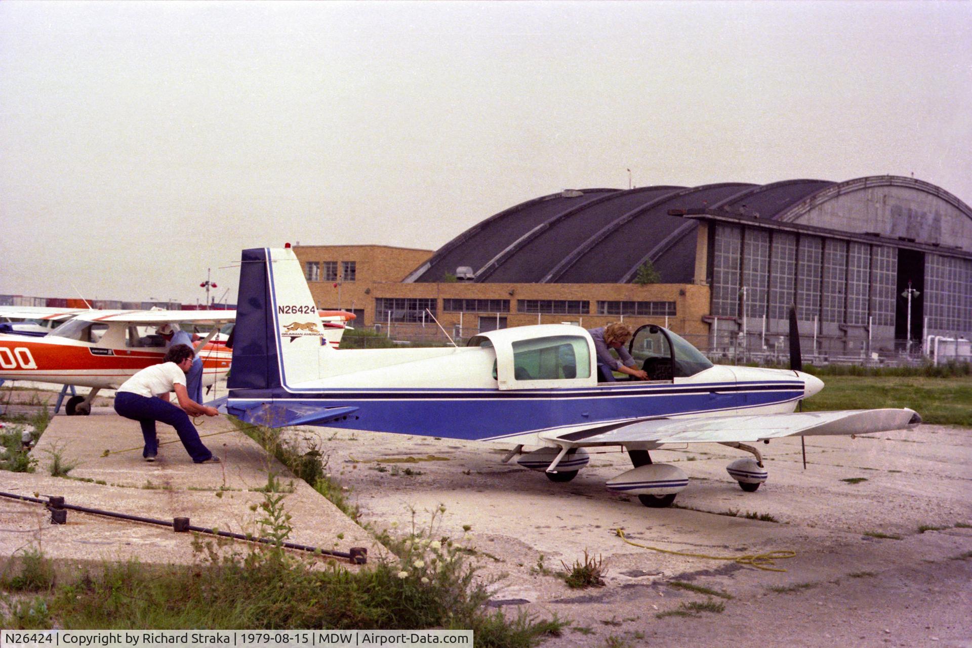 N26424, 1978 Grumman American AA-5A Cheetah C/N AA5A0584, Getting tied up after a flight.