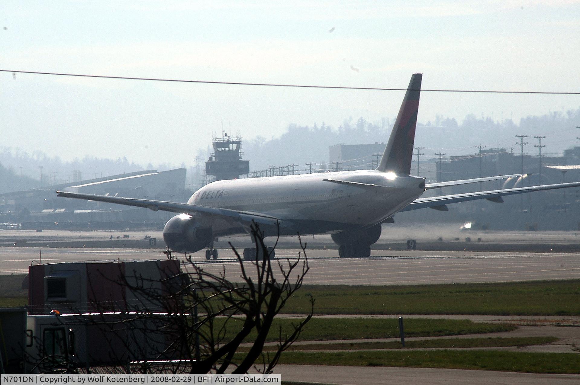 N701DN, 2008 Boeing 777-232/LR C/N 29740, cleared for take-off, runway 13 right.