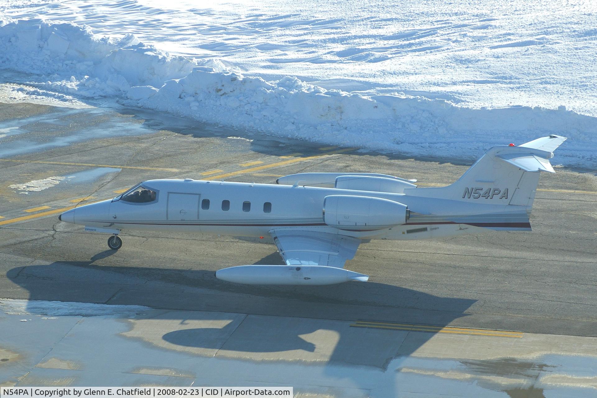 N54PA, 1974 Gates Learjet 36 C/N 004, Taxiing by the control tower