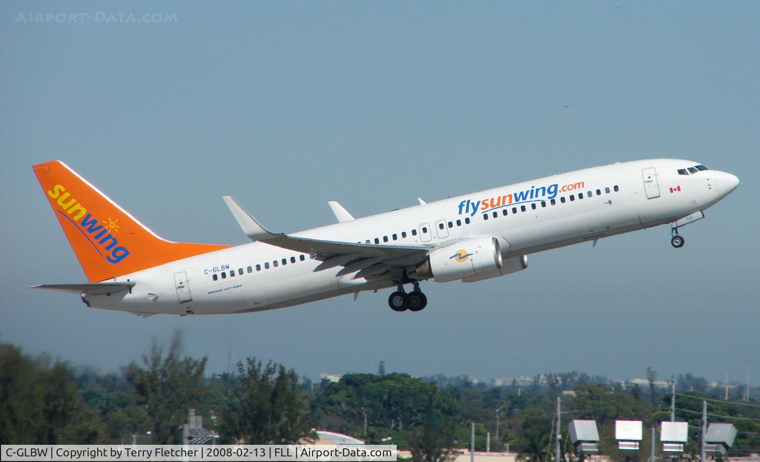 C-GLBW, 2003 Boeing 737-8Q8 C/N 30671, Sunwings B737 climbs away from Ft.Lauderdale Int in Feb 2008