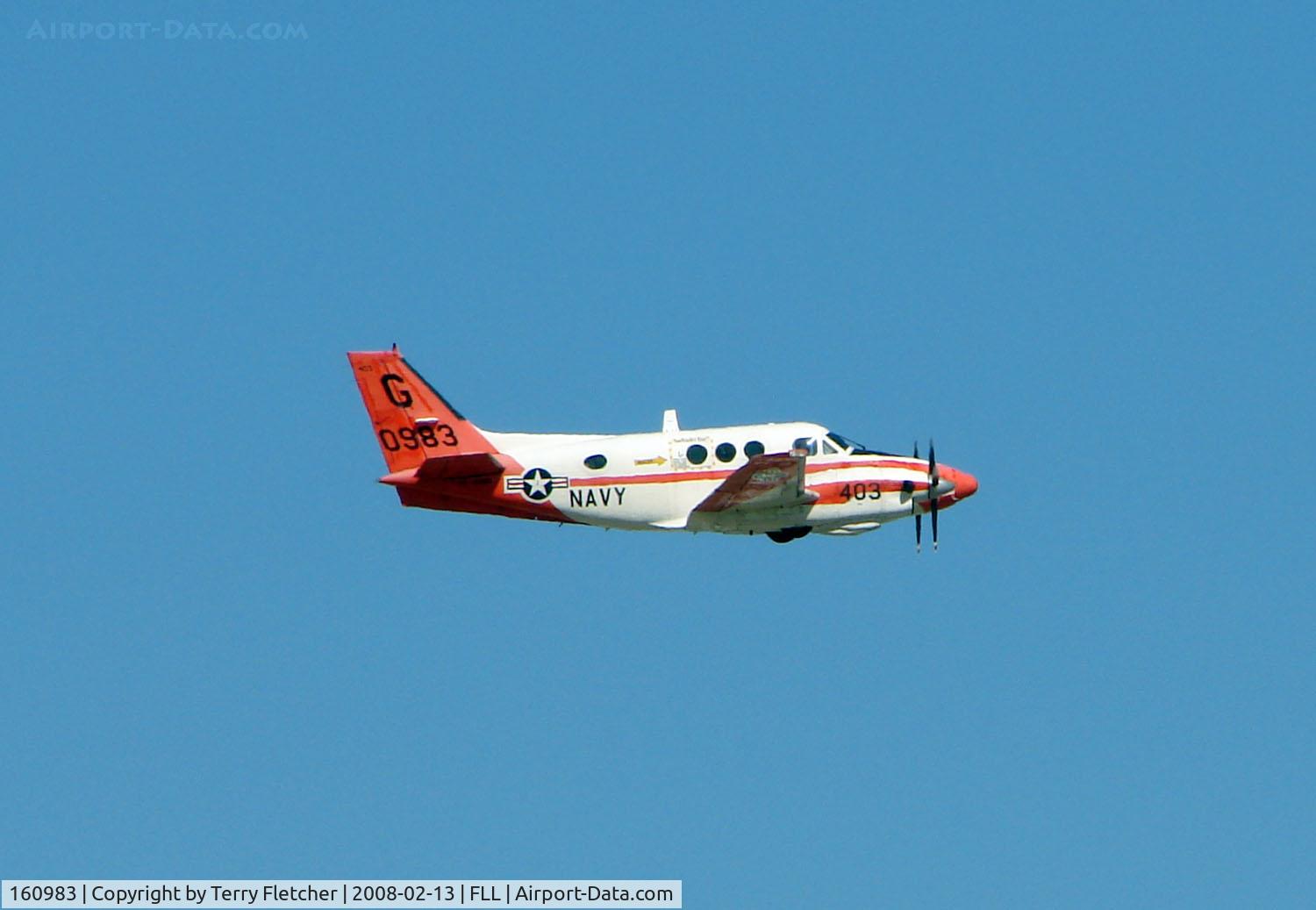 160983, Beechcraft T-44A Pegasus C/N LL-35, Beech King Air H90 climbs out of Ft.Lauderdale Int