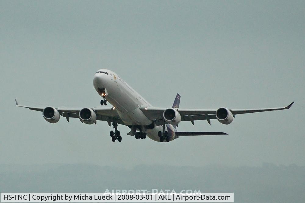 HS-TNC, 2005 Airbus A340-642 C/N 689, Climbing out of Auckland