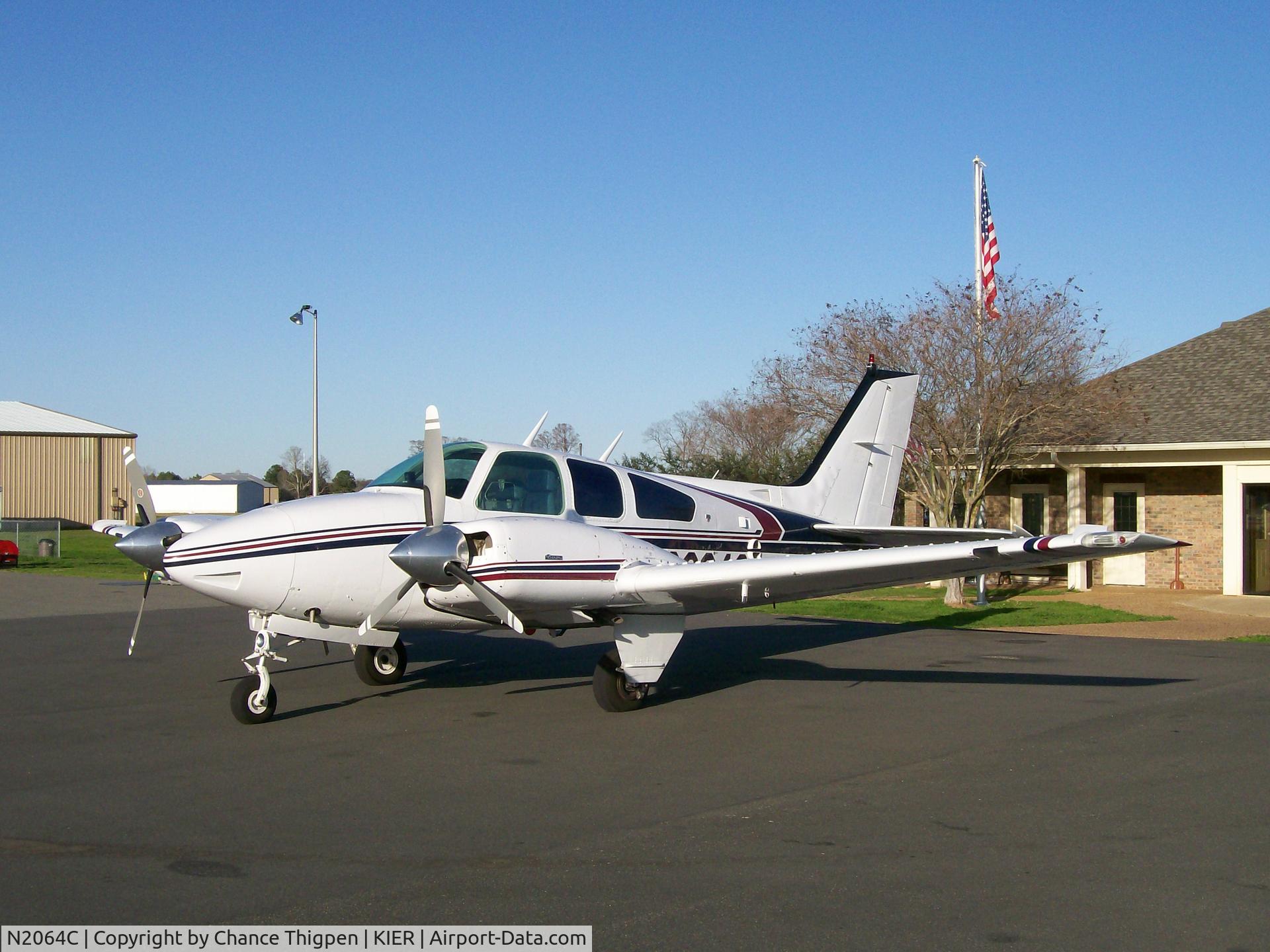 N2064C, 1979 Beech 95-B55 (T42A) Baron C/N TC-2212, On the ramp with the sun setting